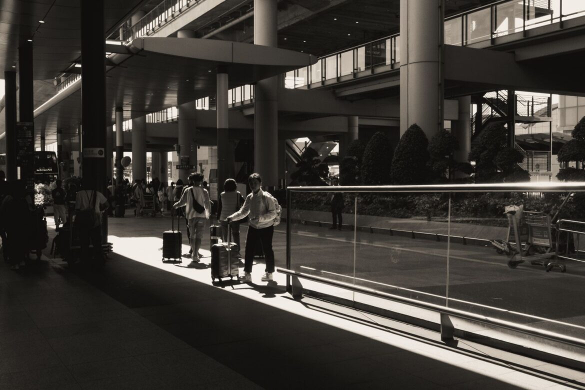 Travelers at airport terminal