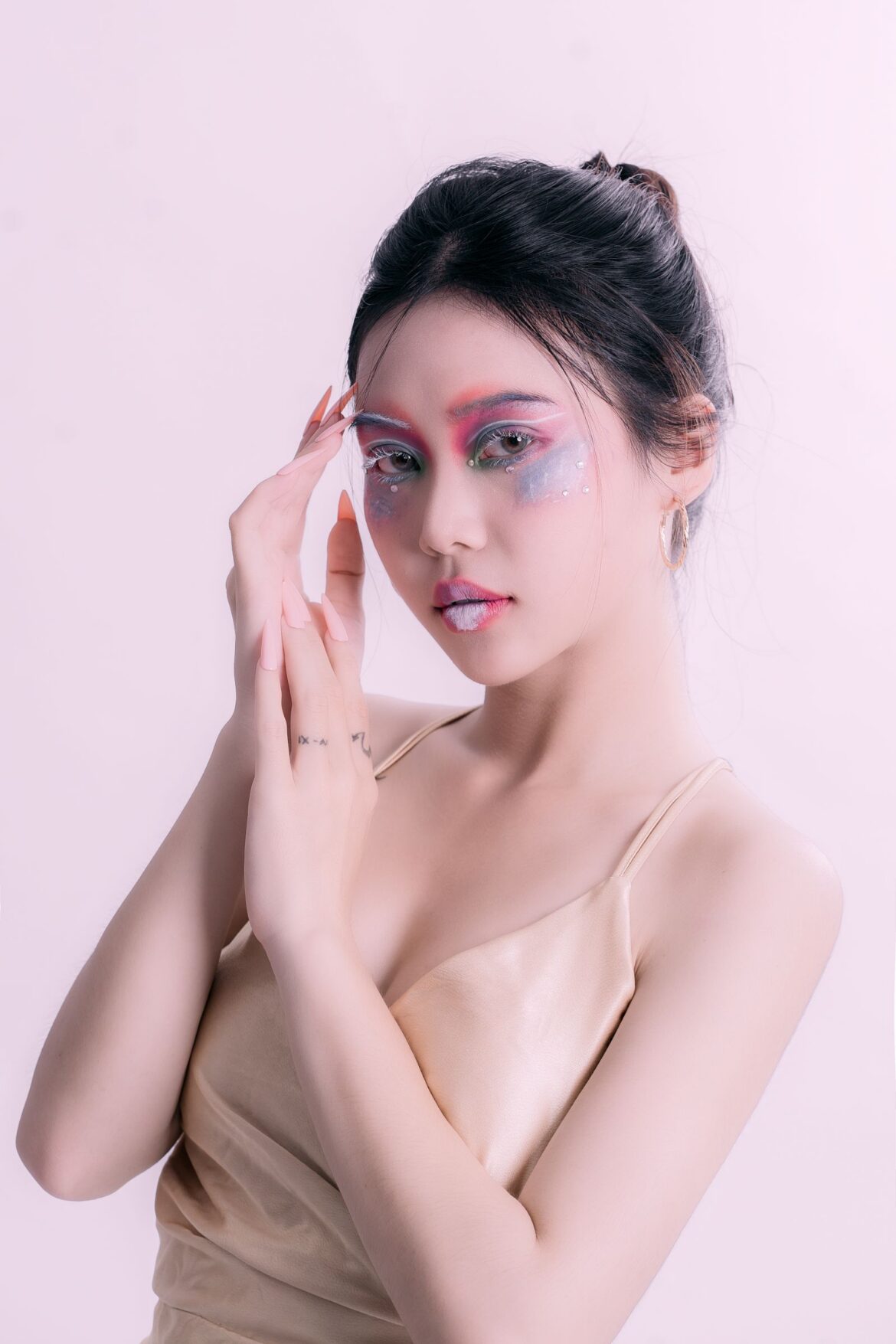 Elegant portrait of woman with creative eye makeup
