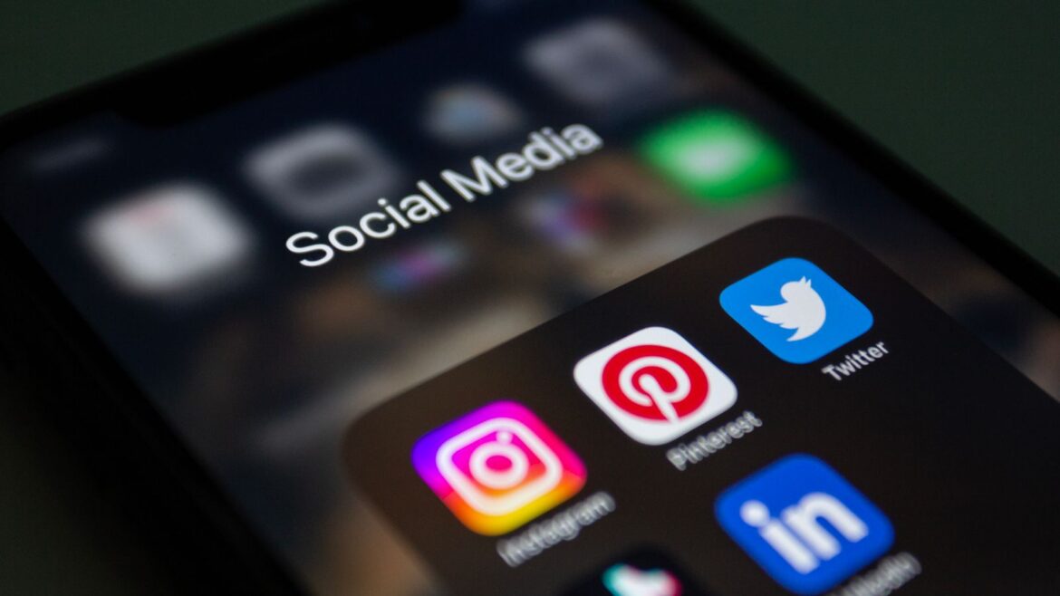 A smartphone screen showing social media apps