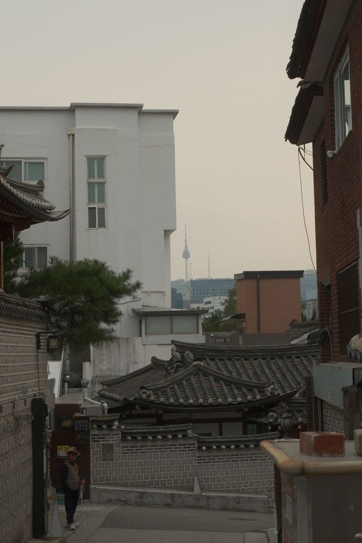 Traditional charm of Seoul with N Seoul Tower peeking through Bukchon Hanok Village