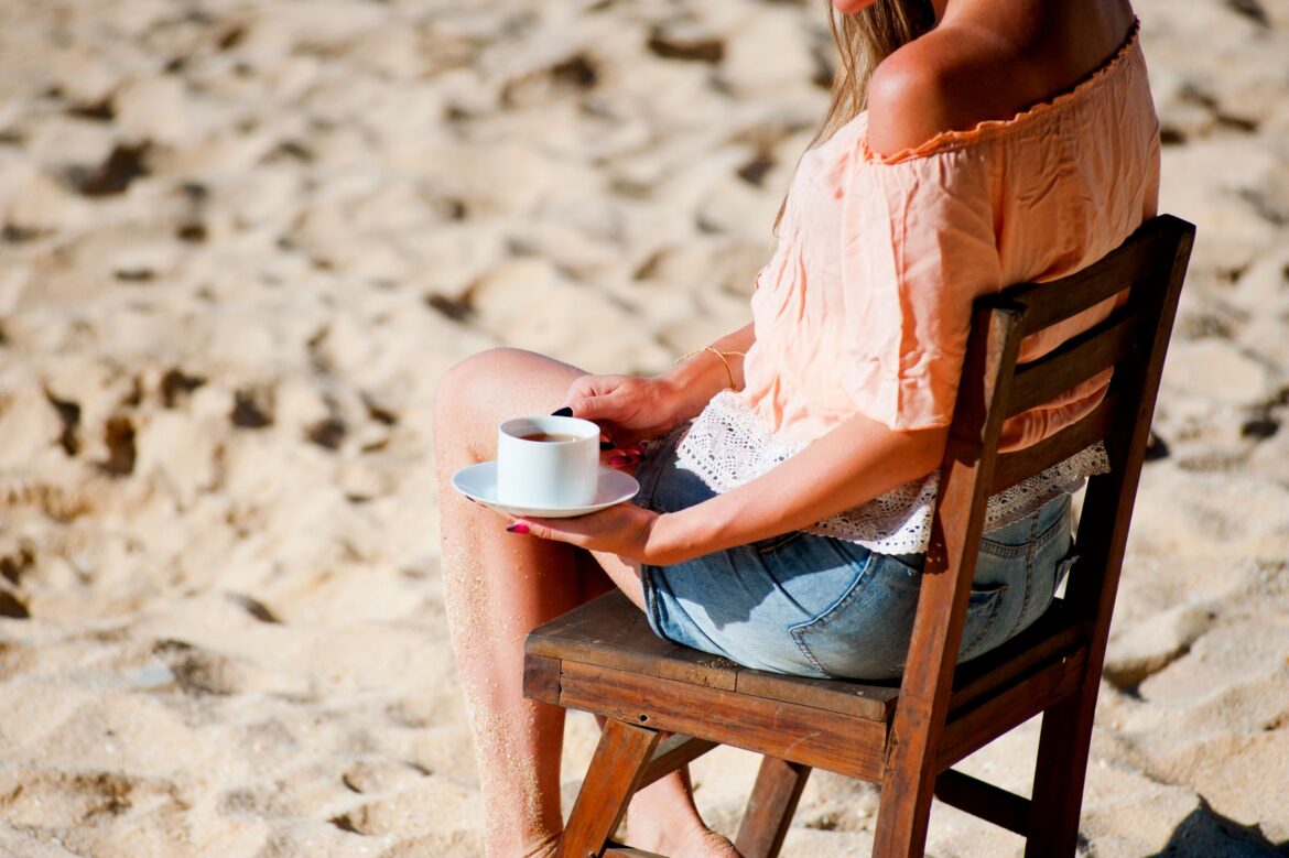 A person relaxing on vacation at the beach