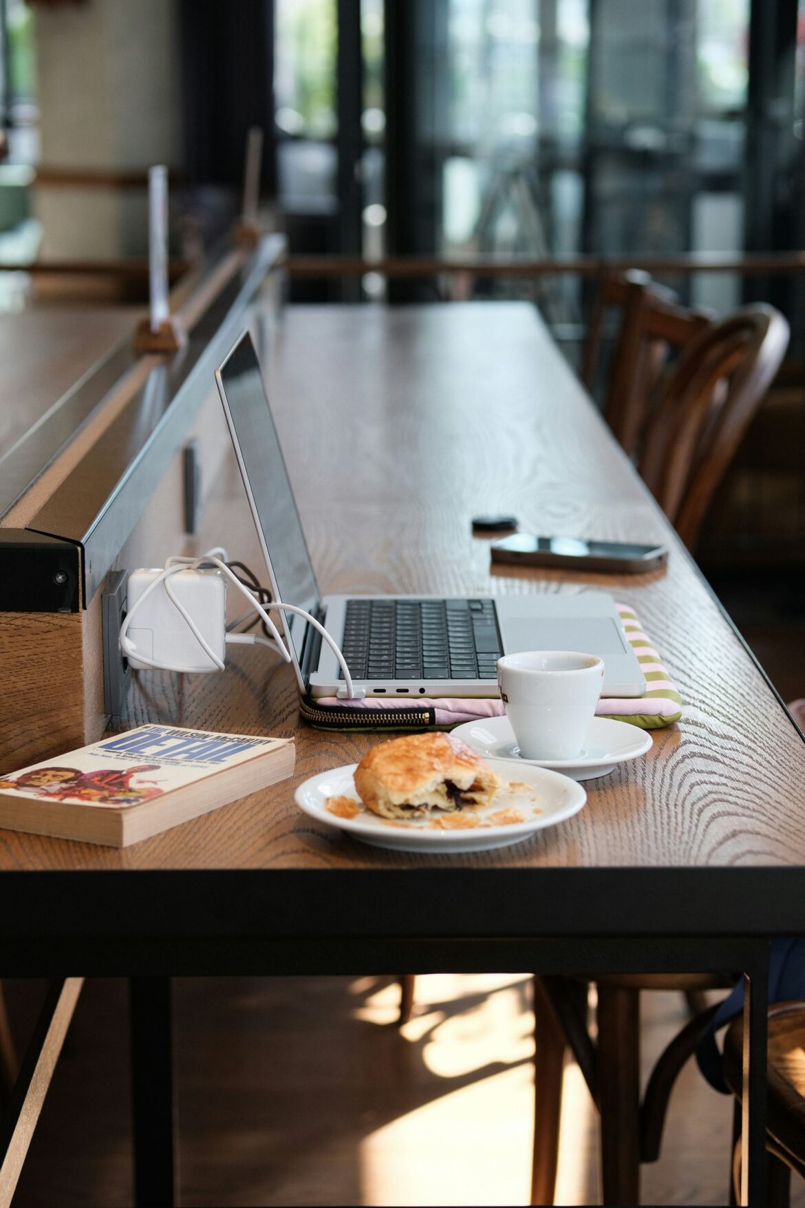 A cozy workspace with laptop and coffee