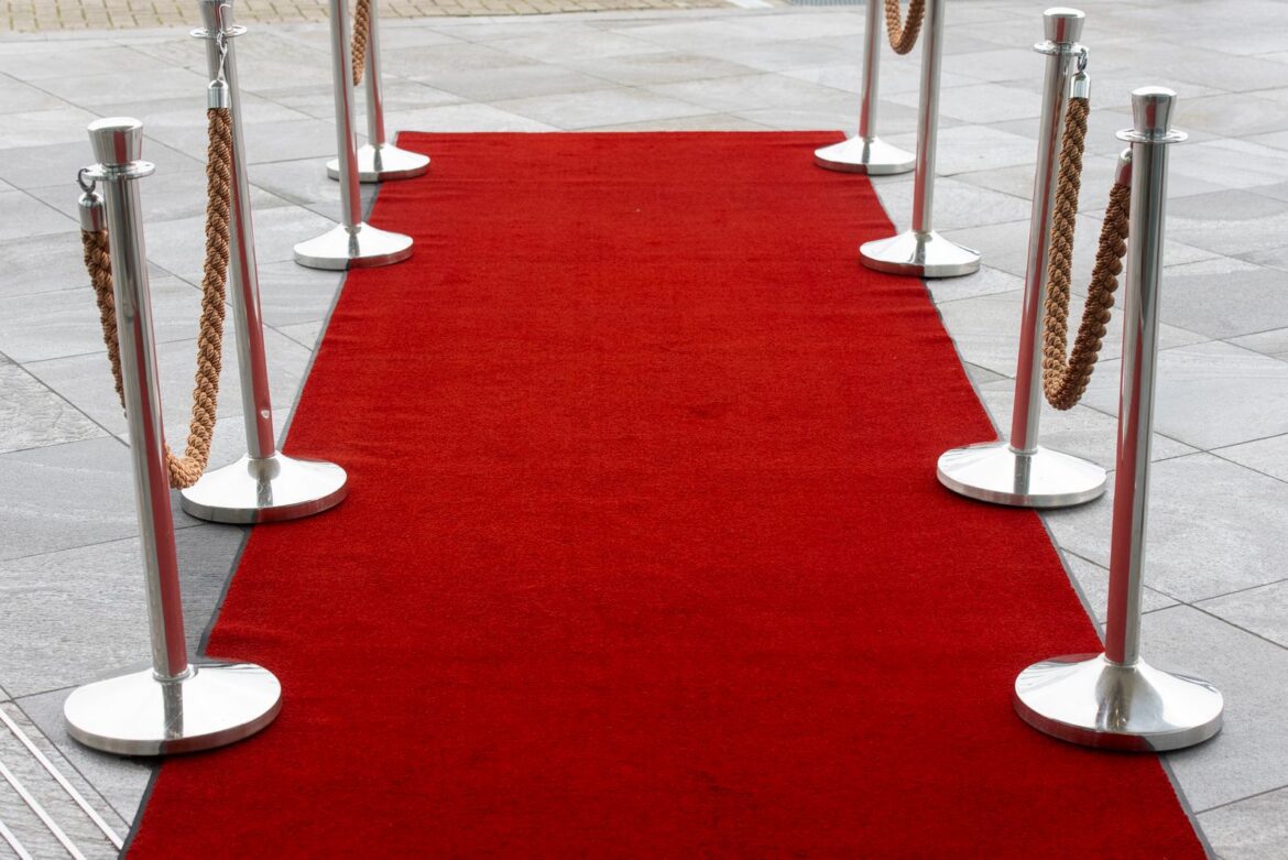 Red carpet entrance at a film festival, representing Korean cinema returning to the Cannes competition lineup