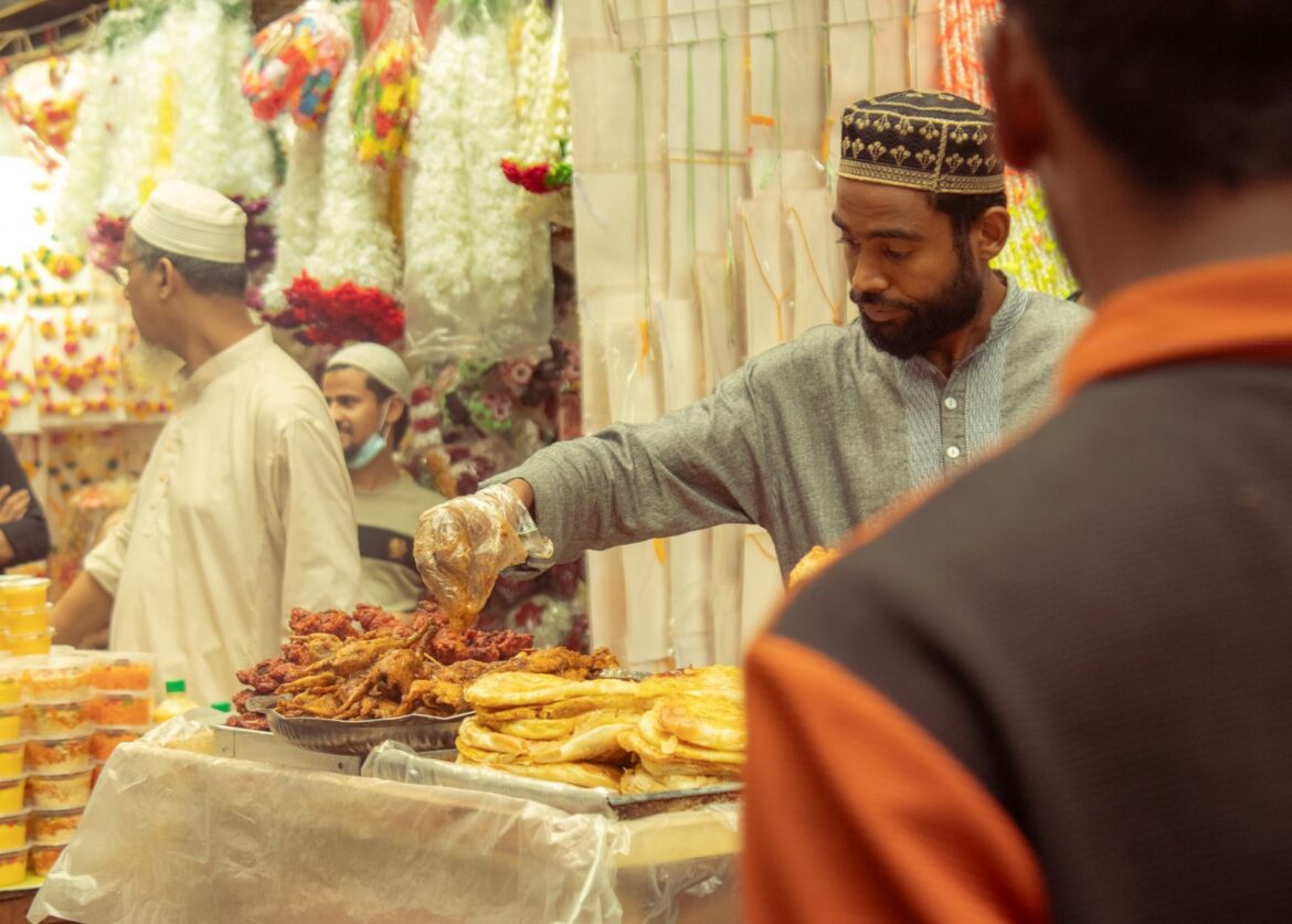 A street vendor selling traditional fried snacks