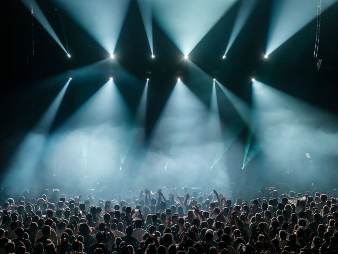 Concert crowd under stage lights