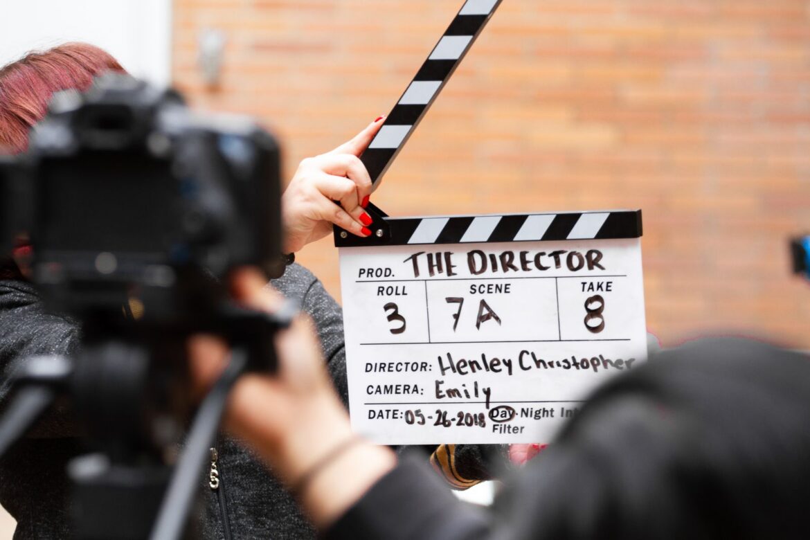 Film clapperboard in action on set