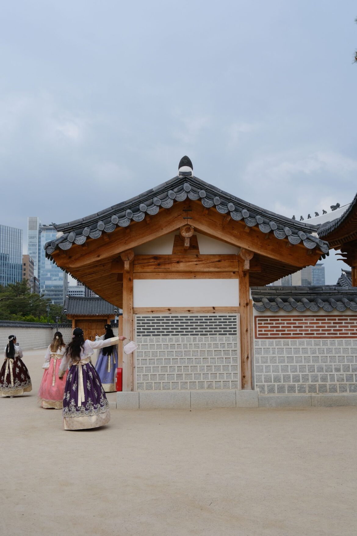 Women in hanbok dresses at Gyeongbokgung Palace Seoul cultural heritage