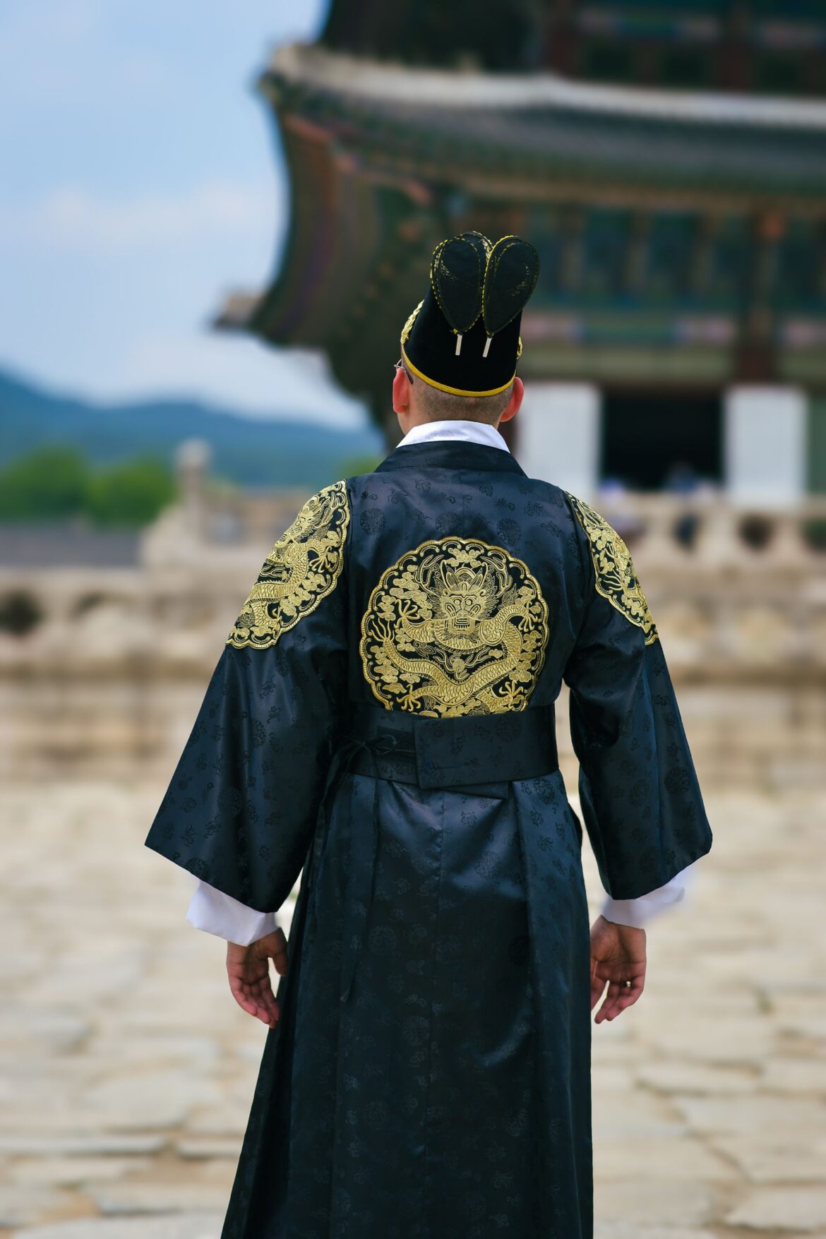 Traditional Korean hanbok at a historic palace, representing the Joseon-era setting of the box office hit The Man Who Lives with the King