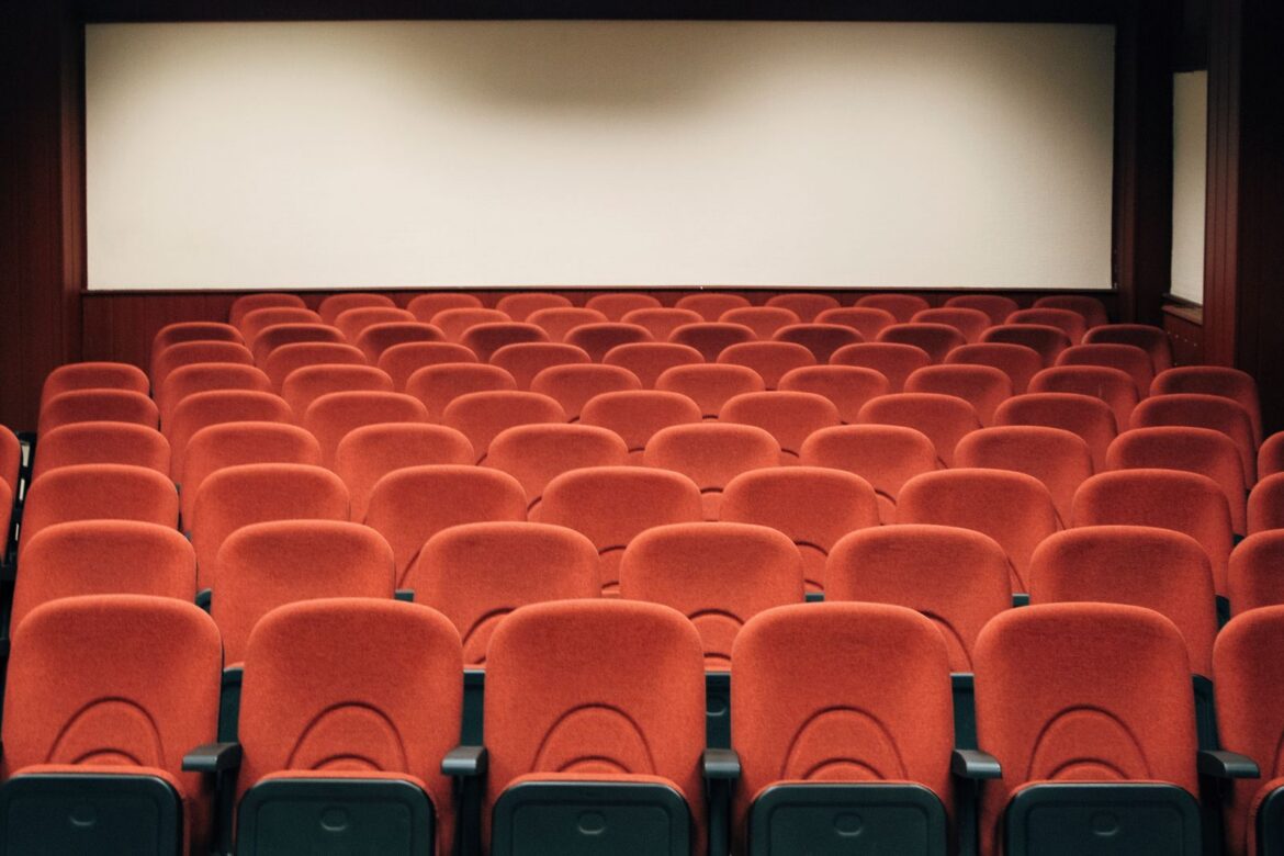 Cinema theater seating, representing the box office success of The Man Who Lives with the King