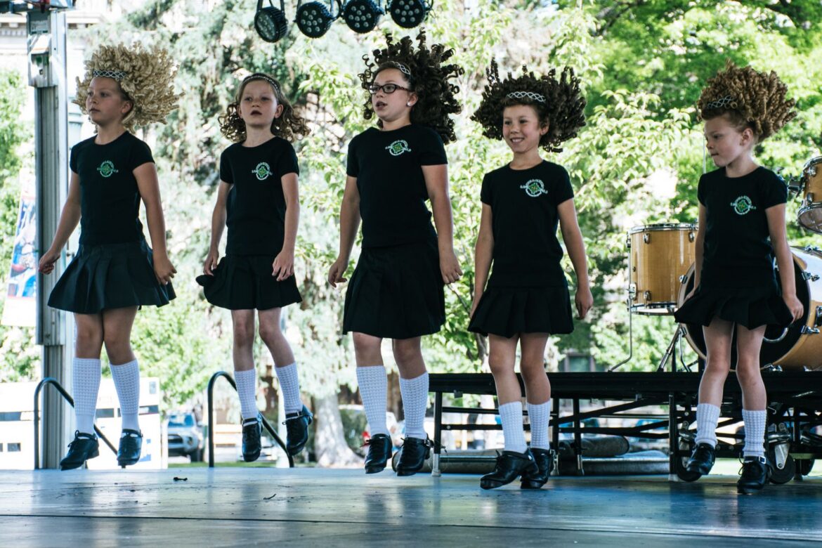 A girl group performing on stage