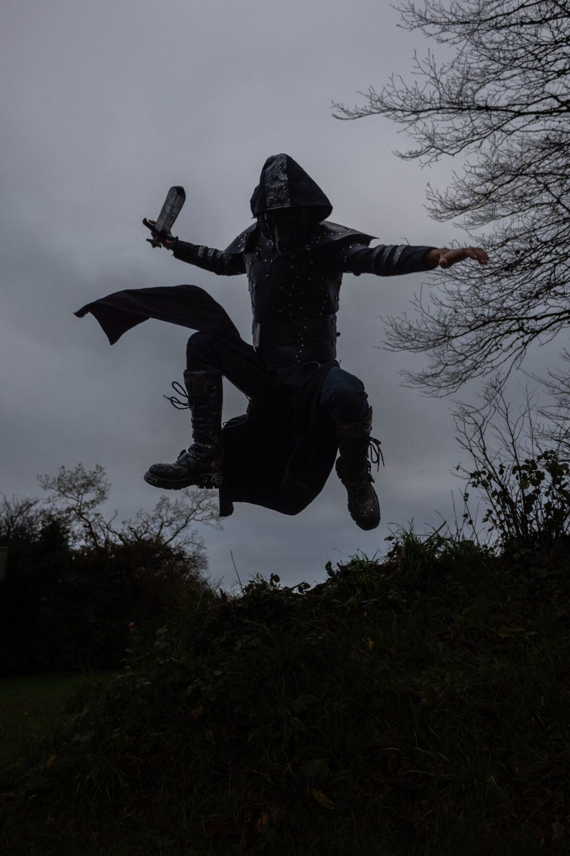 A person in fantasy costume with a sword