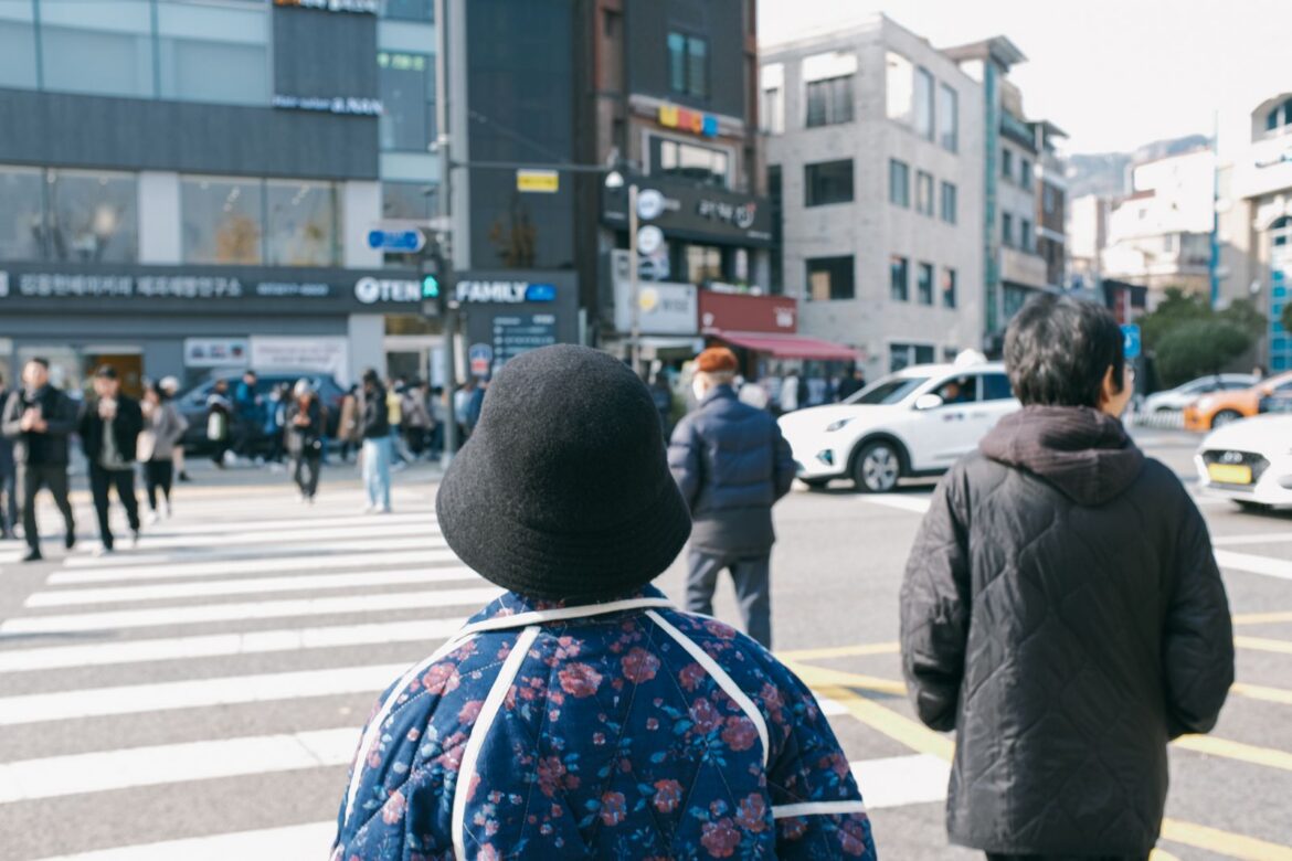 Pedestrians at crosswalk in Seoul