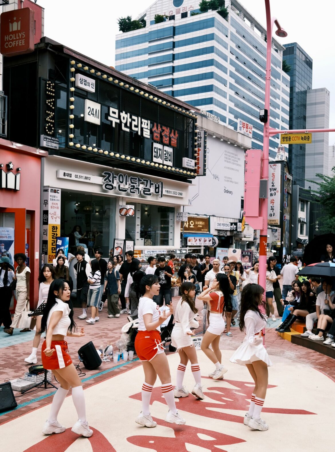 Vibrant street dance performance attracting a lively crowd in Seoul South Korea