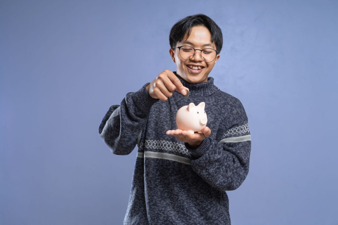 Young person saving money